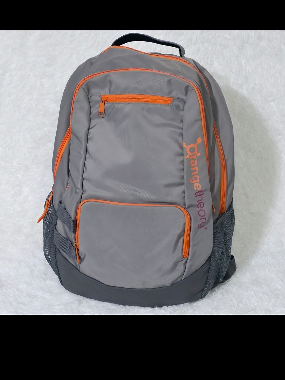 Orangetheory Gray Backpack with Bright Orange Trim and Logo